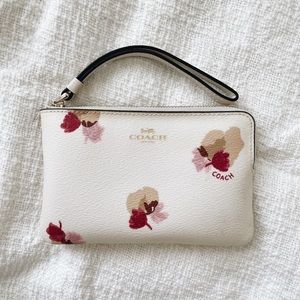 Coach pink floral wristlet